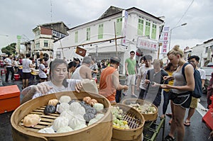 Hawkers sell Chinese Steamed Meat Buns at street